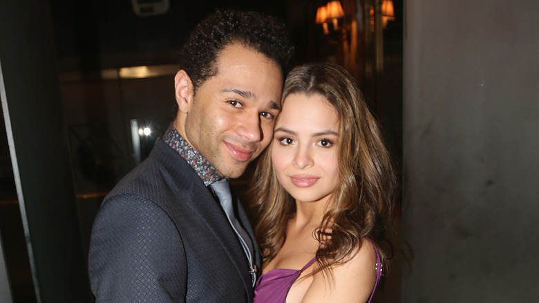 Corbin Bleu and Sasha Clements cheek to cheek