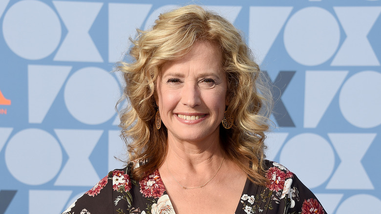 Nancy Travis smiling