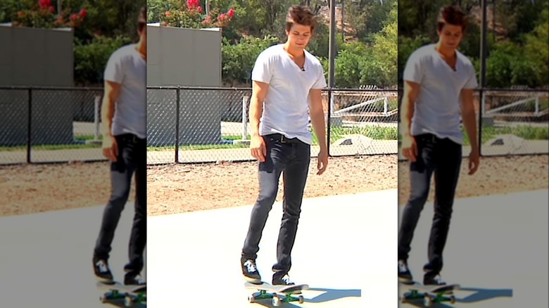 Young Casey Deidrick on a skateboard