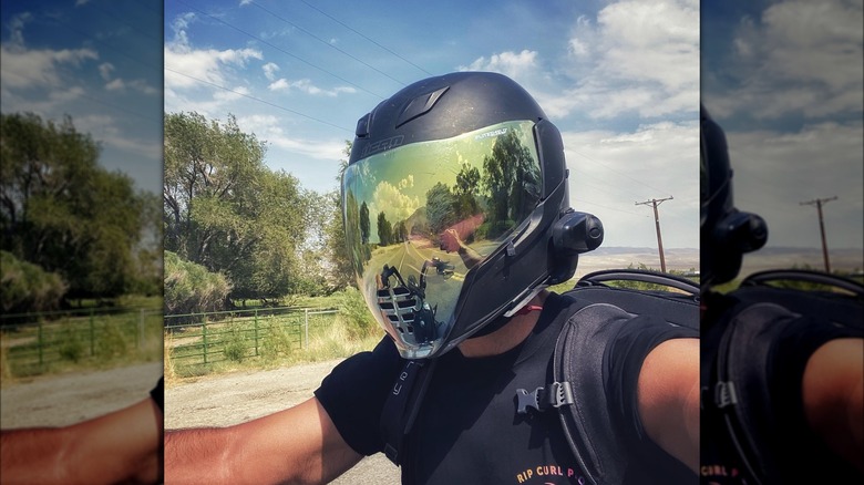 Ryan Paevey on a motorcycle