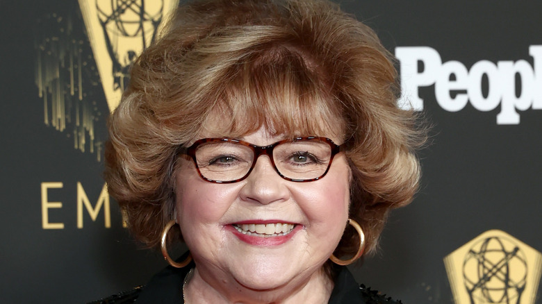 Patrika Darbo with glasses and smiling