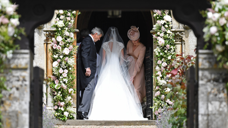 Pippa Middleton walking into wedding ceremony 