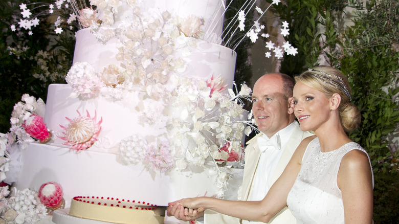 Prince Albert and Princess Charlene cutting their wedding cake