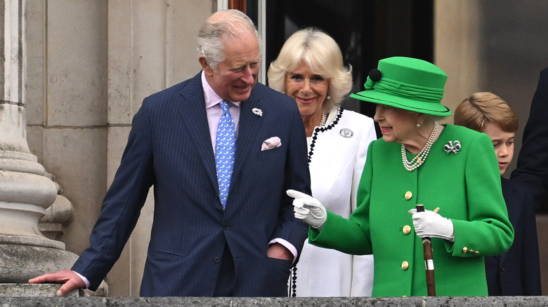 Charles laughing with the queen