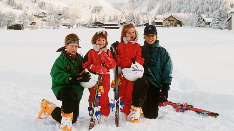 Prince Harry, Princess Eugenie, Princess Beatrice, and Prince William posing for photocall in Switzerland as children