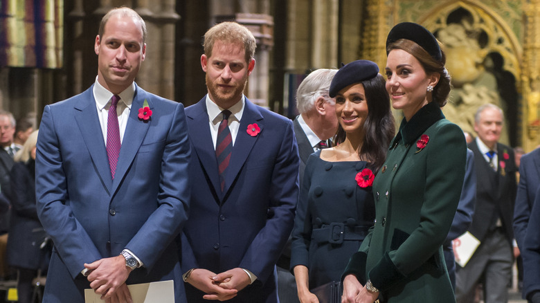 Prince William, Prince Harry, Meghan Markle and Kate Middleton standing together