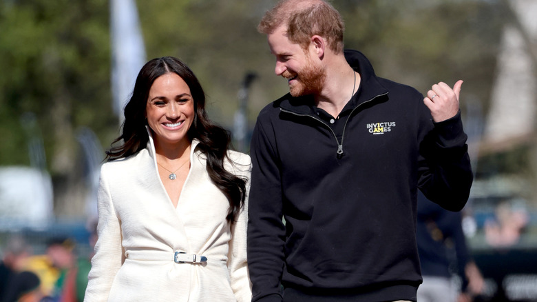 Prince Harry and Meghan Markle walking together in the Netherlands