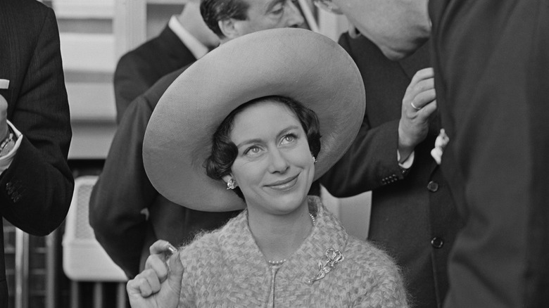Princess Margaret smiling in big hat