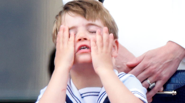 Prince Louis looking exasperated