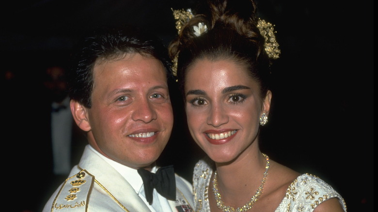 King Abdullah and Queen Rania smiling on wedding day