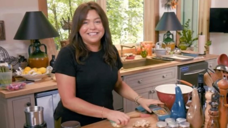 Rachael Ray cooking and smiling