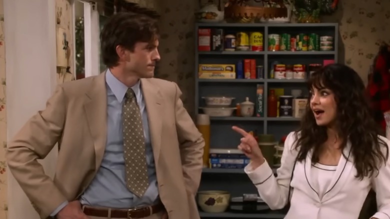 Ashton Kutcher and Mila Kunis acting on That '90s Show