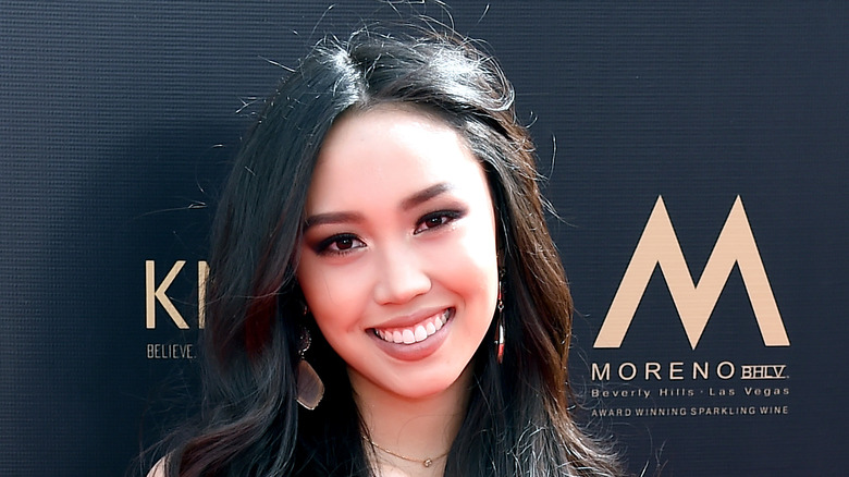 Thia Megia poses at an event. 