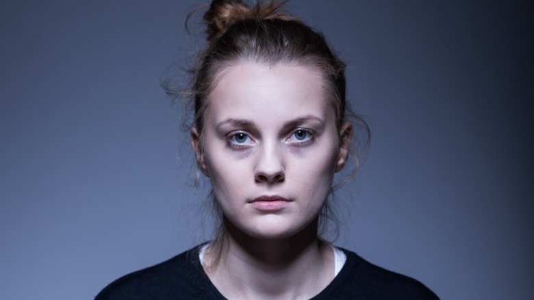 woman with dull skin and hair