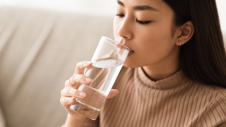 A woman drinking water