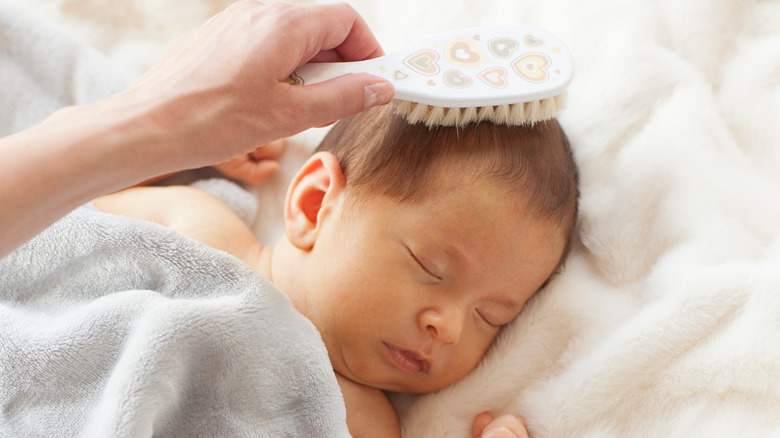 Brushing baby's hair