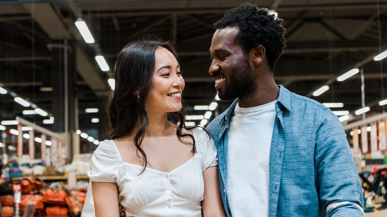 Couple in love smiling at each other