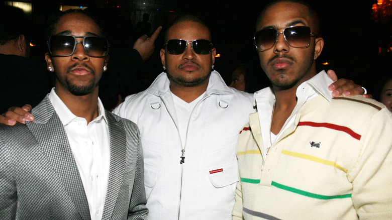 Omarion, Chris Stokes, and Marques Houston posing for the camera