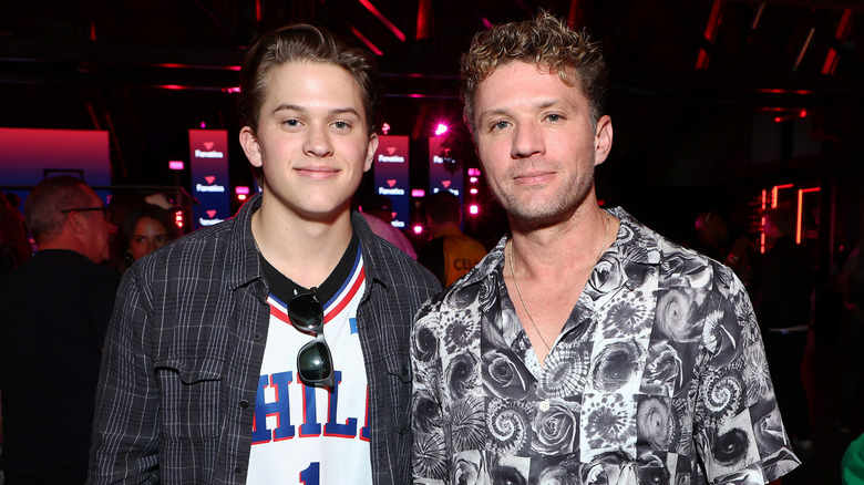 Deacon Phillippe posing with dad Ryan 