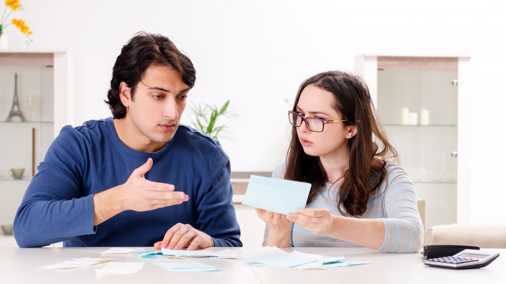 Couple planning a budget together