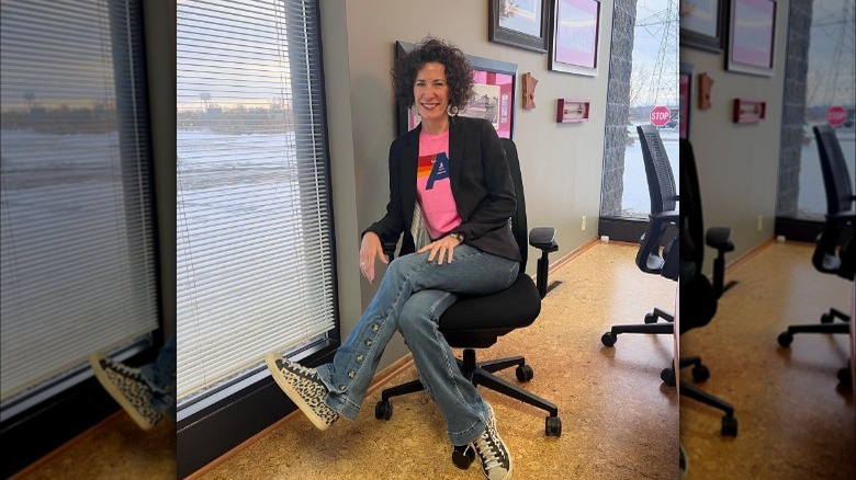 Lindsey Uselding sitting in an office chair 