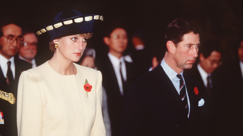 Princess Diana and Prince Charles walking