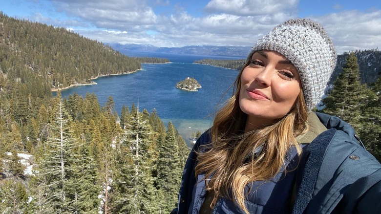 Taylor Cole taking a lake selfie