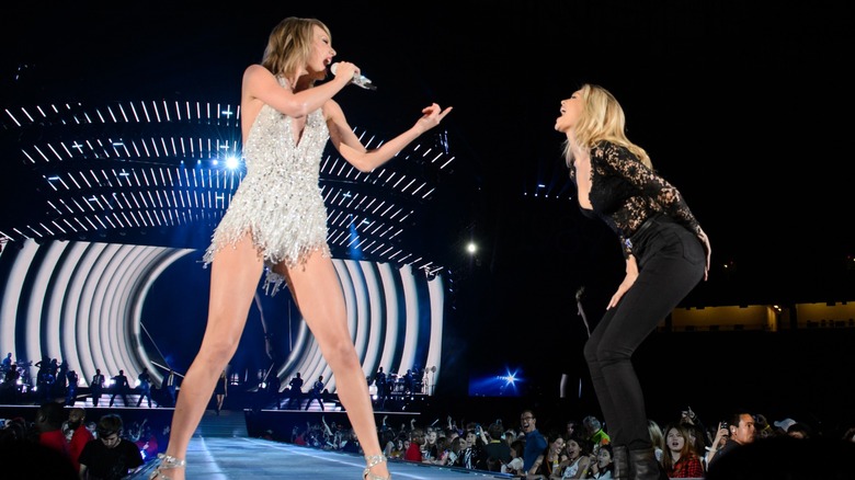 Taylor Swift on stage with Gig Hadid