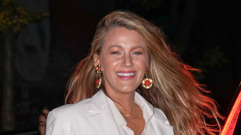 Blake Lively smiling outside at night