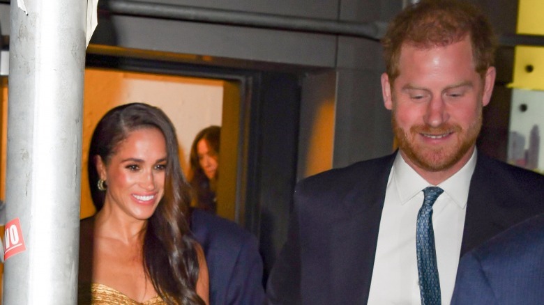 Meghan Markle and Prince Harry holding hands