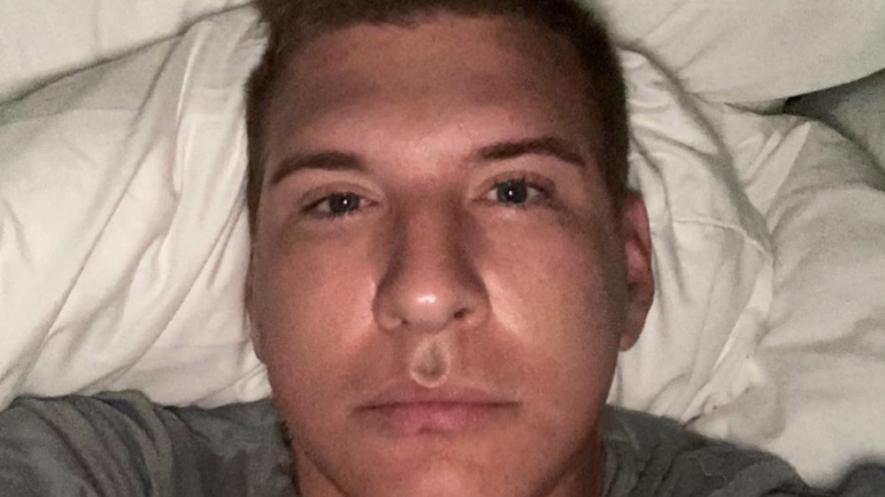 Todd Chrisley in his bed, in a selfie