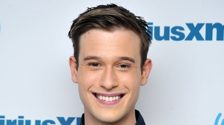 Tyler Henry with a small smile