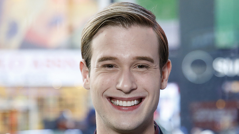 Tyler Henry smiling for camera