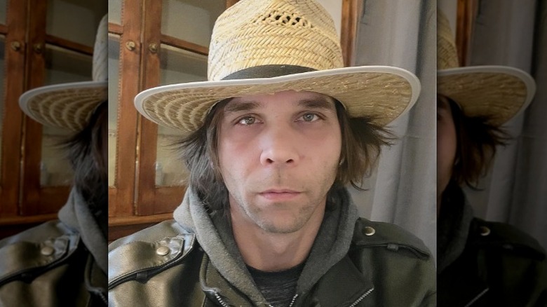 Jeremiah Raber wearing straw hat