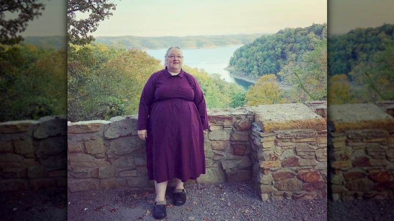 Mary Schmucker posing in front of lake