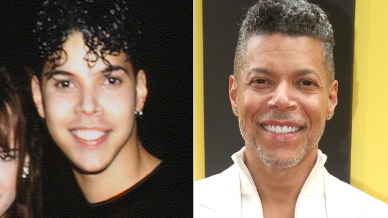 Wilson Cruz smiling as a long-haired teen vs as an adult 