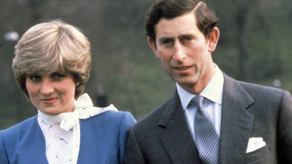 Prince Charles and Princess Diana wearing blue