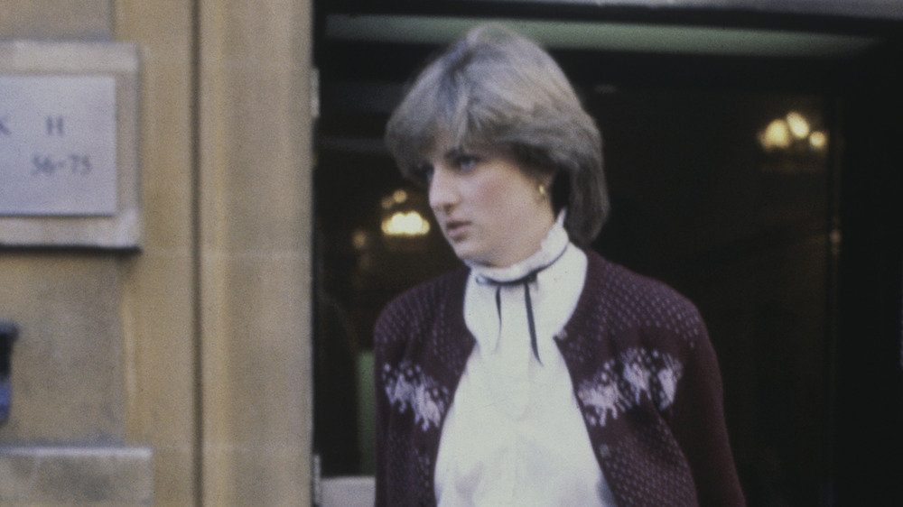 Princess Diana exiting a building
