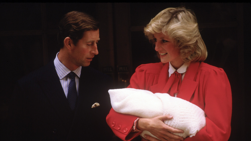 Prince Charles and Princess Diana with baby Prince Harry