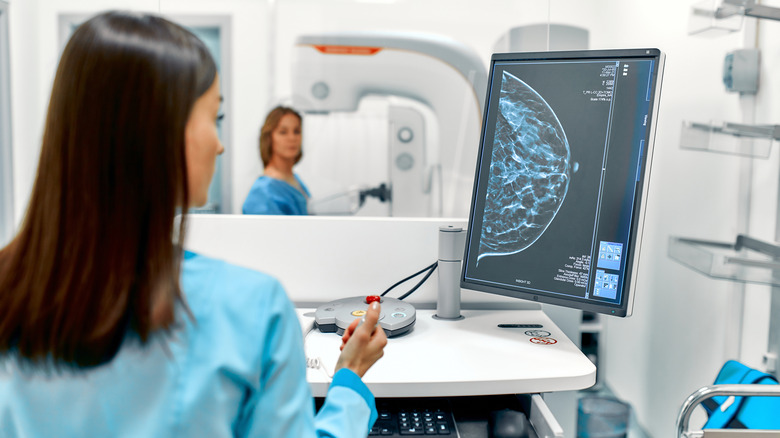 Woman examining x-rays after a mammogram