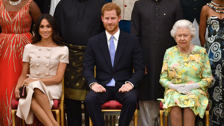 Queen Elizabeth II and Meghan Markle and Prince Harry