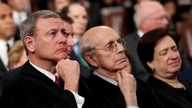 Dissenting Justices John Roberts, Stephen Breyer, and Elena Kagan