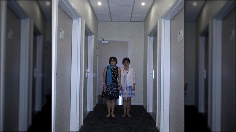 Lisa and Louise Burns in hotel hallway