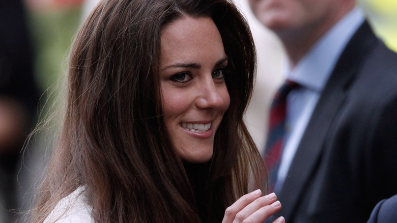 Catherine entering the Goring Hotel