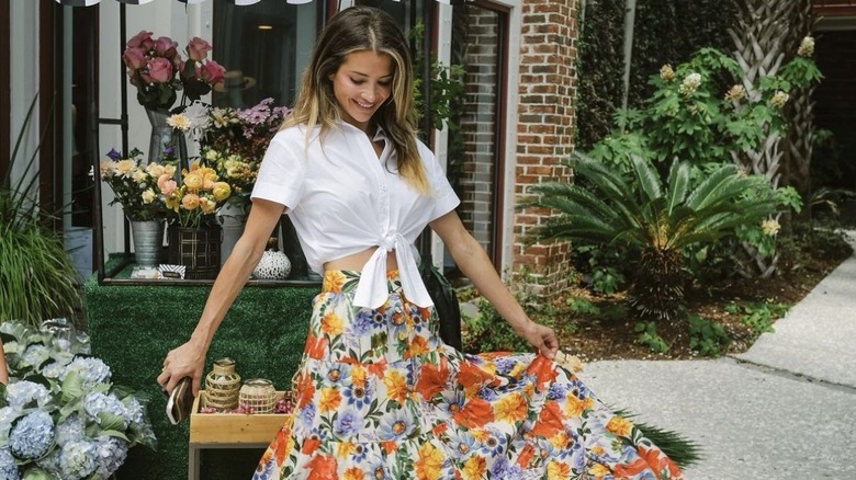 Naomie Olindo wearing a floral skirt