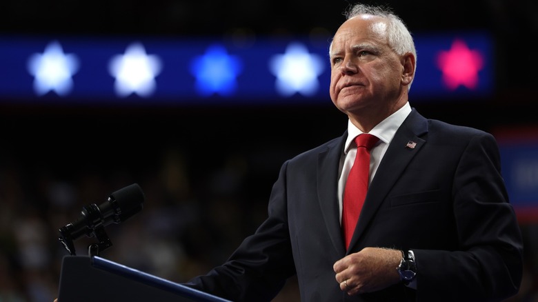 Tim Walz standing at podium