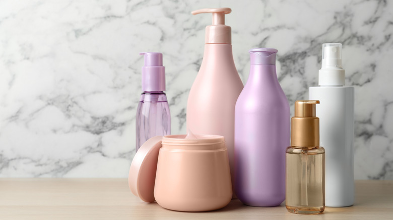 Hair products with pink and purple bottles