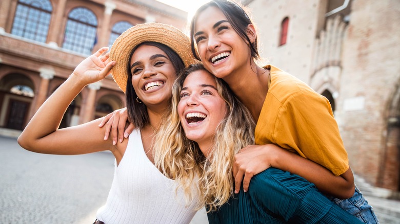 woman and friends happy