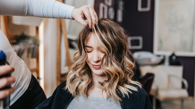 Woman in a chair at the salon