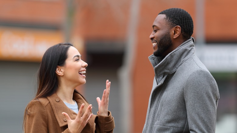 Two people smiling